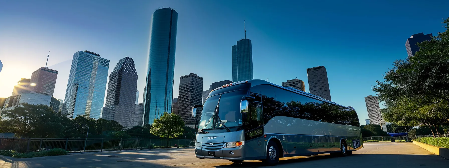 a sleek private charter bus is parked prominently in front of a renowned houston landmark, showcasing the city’s vibrant architecture against a clear blue sky as potential travelers gather, engaged in lively discussions about pricing and booking options. a sleek private charter bus is parked prominently in front of a renowned houston landmark, showcasing the city’s vibrant architecture against a clear blue sky as potential travelers gather, engaged in lively discussions about pricing and booking options.